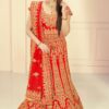 Red raw silk fabric lehenga choli with golden embroidery