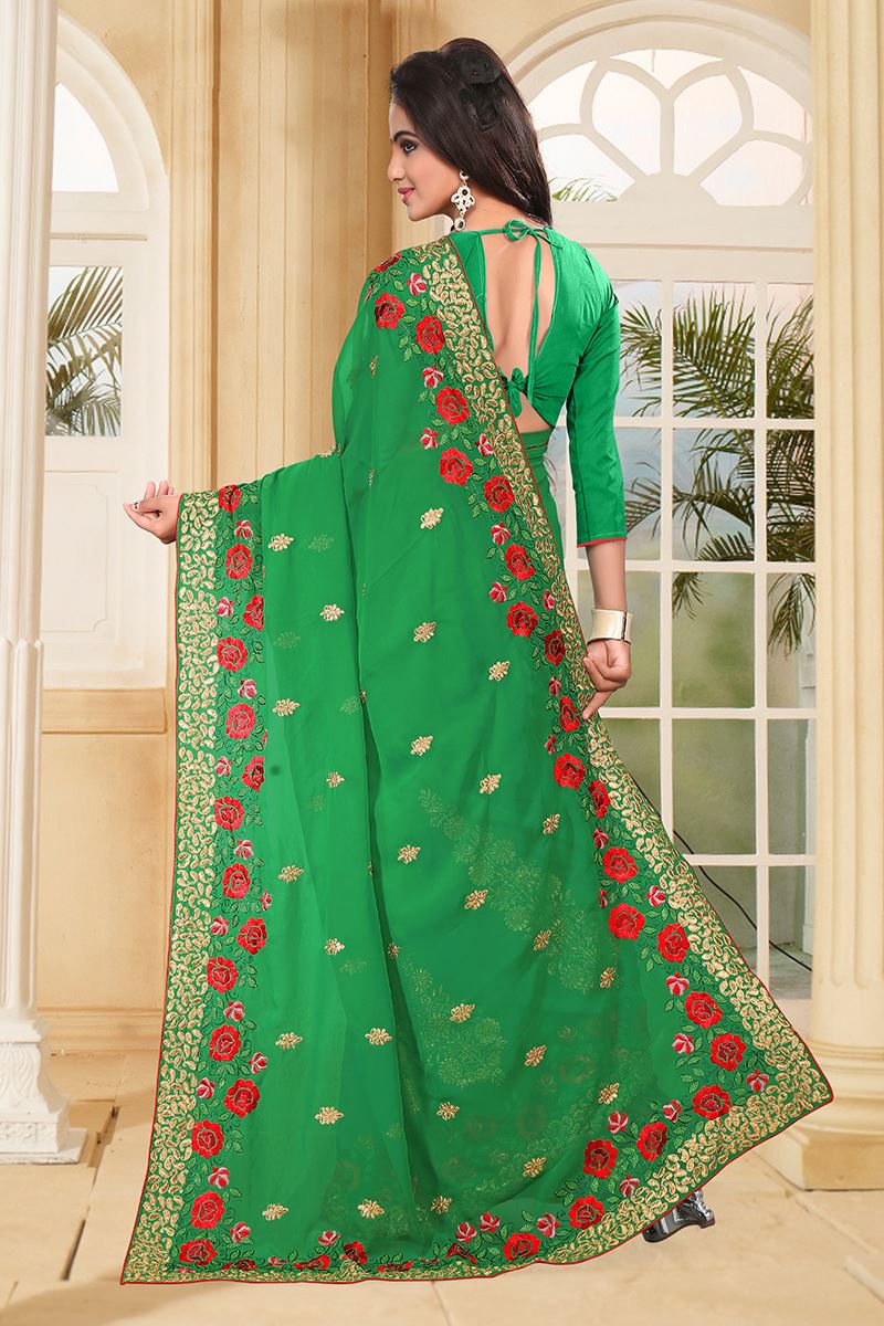 Classic green saree with red resham