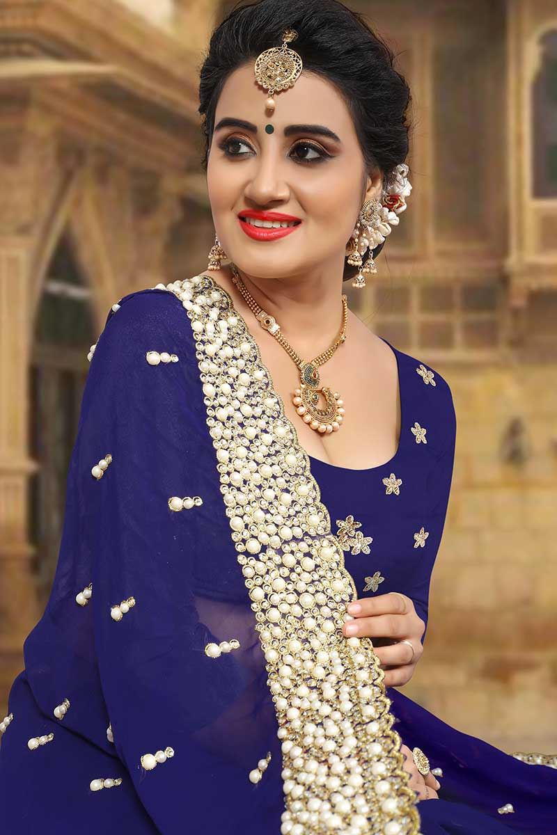 Classy dark blue designer saree with zari