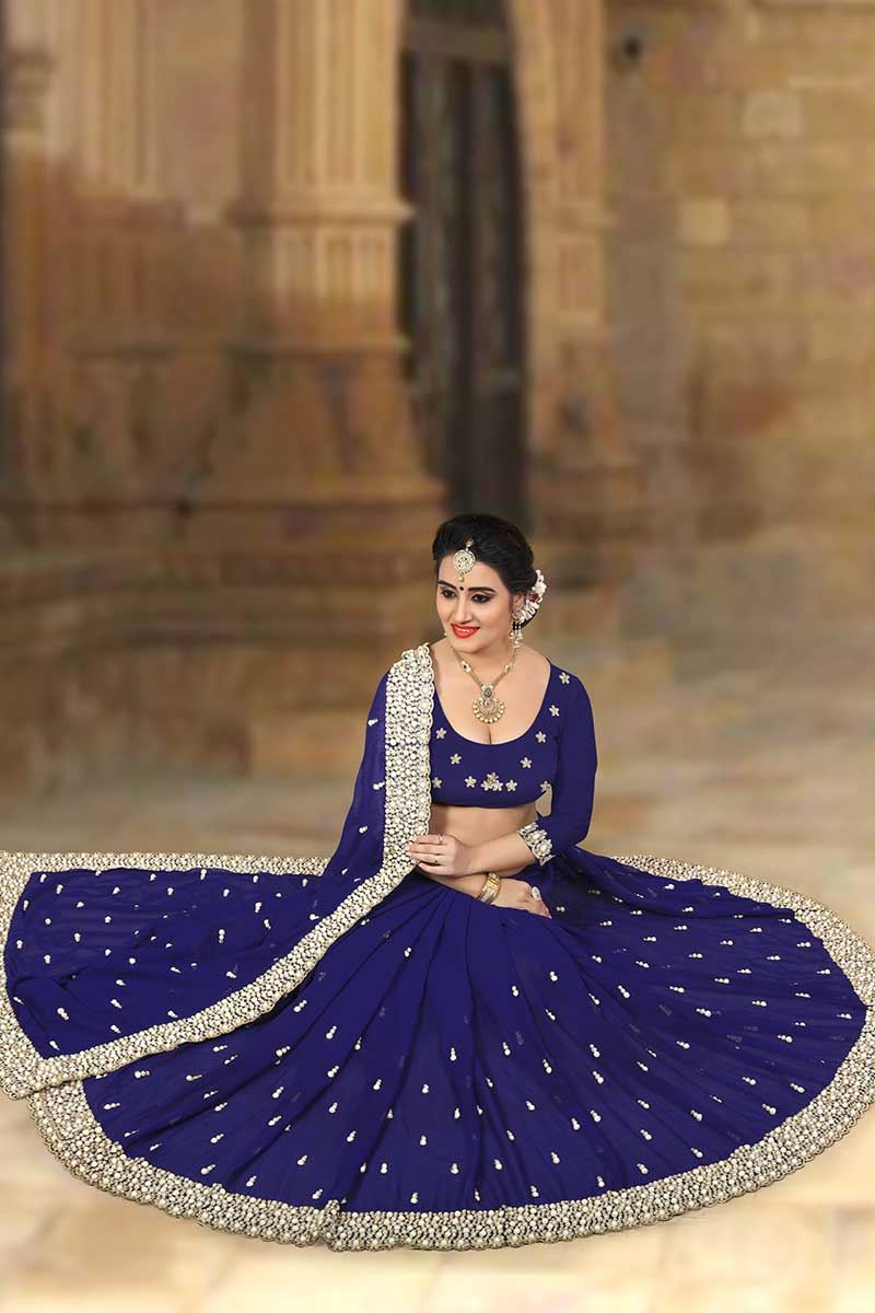 Classy dark blue designer saree with zari