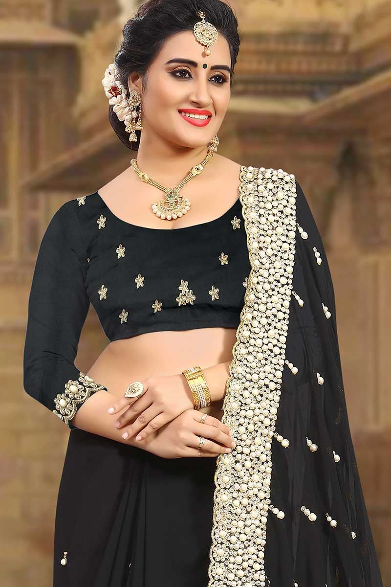 Dignified black designer saree with zari