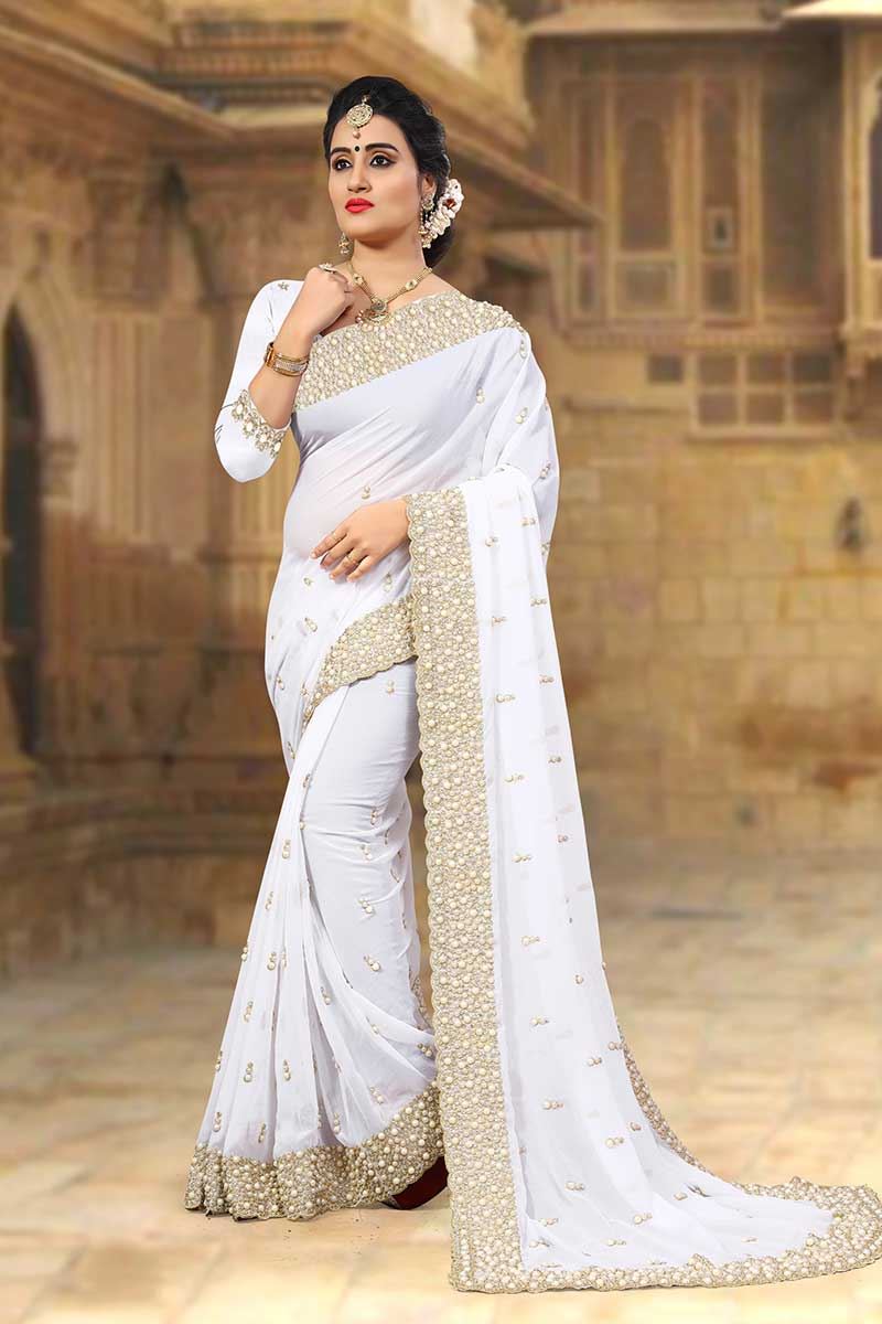 Pristine white designer saree with pearls