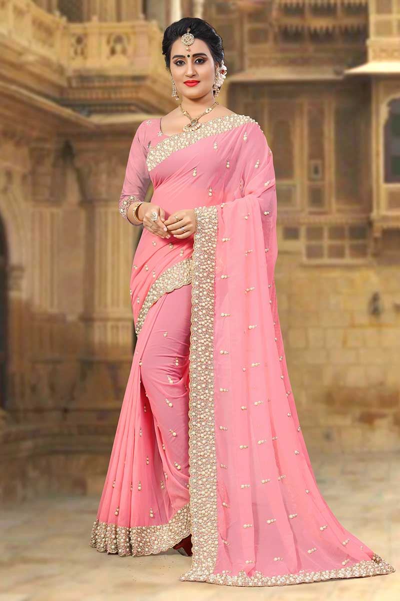 Fashionable Peach designer saree with zari