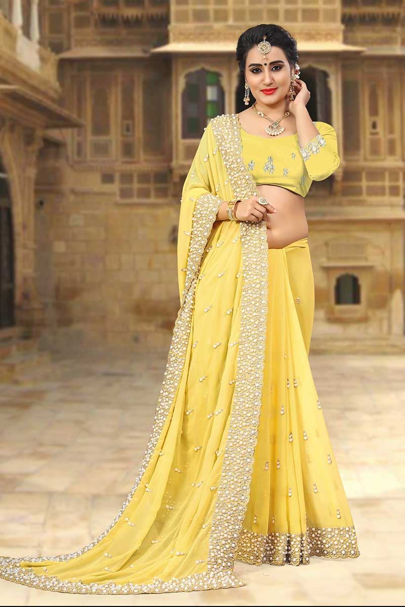 Divine yellow designer saree with pearls