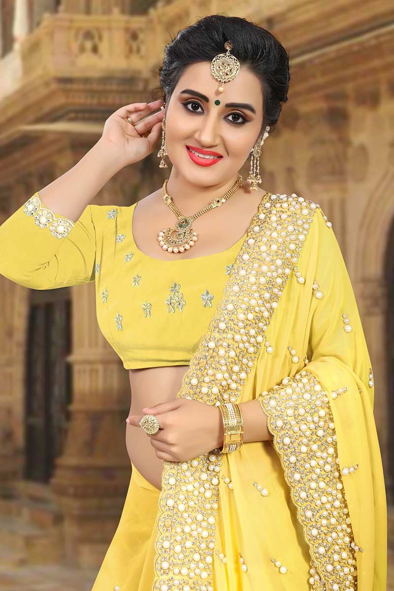Divine yellow designer saree with pearls