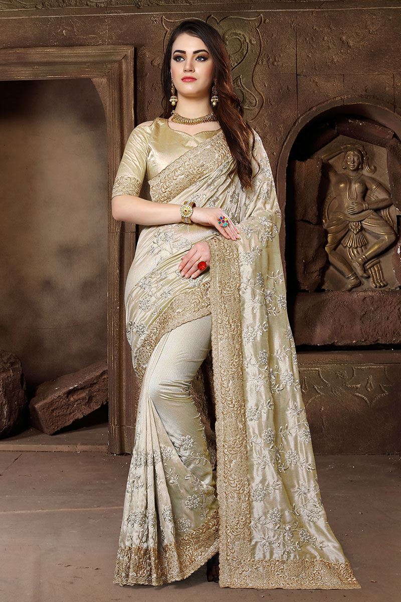 Gripping beige designer saree in resham