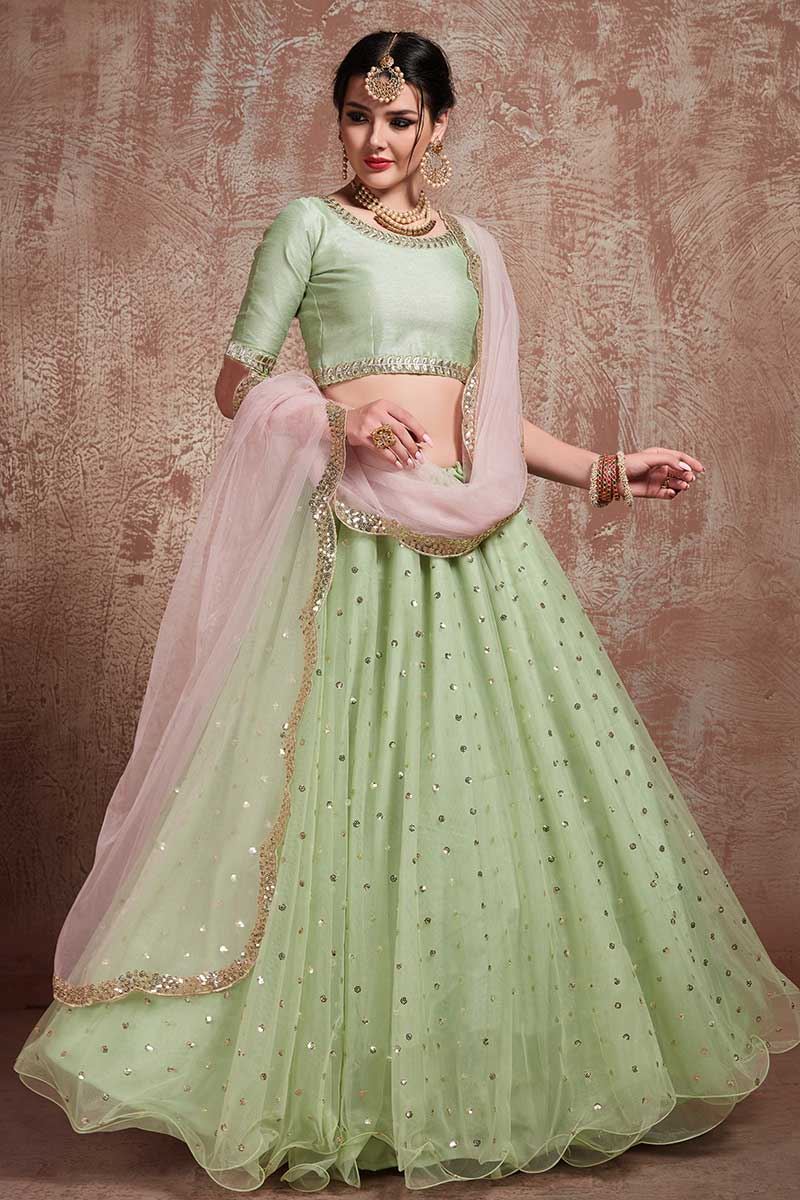 Pistachio Color Party Wear Net Flared Lehenga Choli
