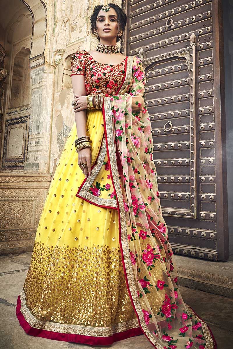 Exclusive Yellow Color Lehenga Choli In Net Fabric With Embroidery Work