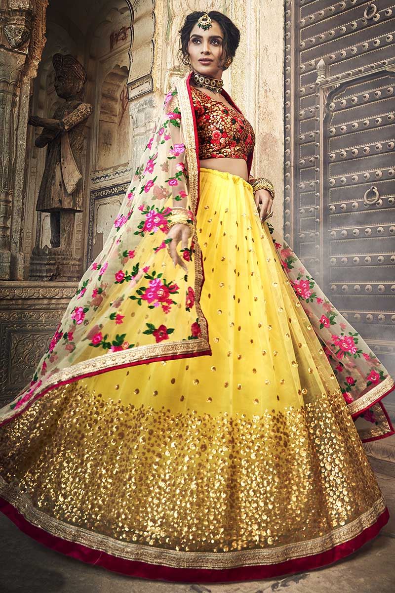 Exclusive Yellow Color Lehenga Choli In Net Fabric With Embroidery Work