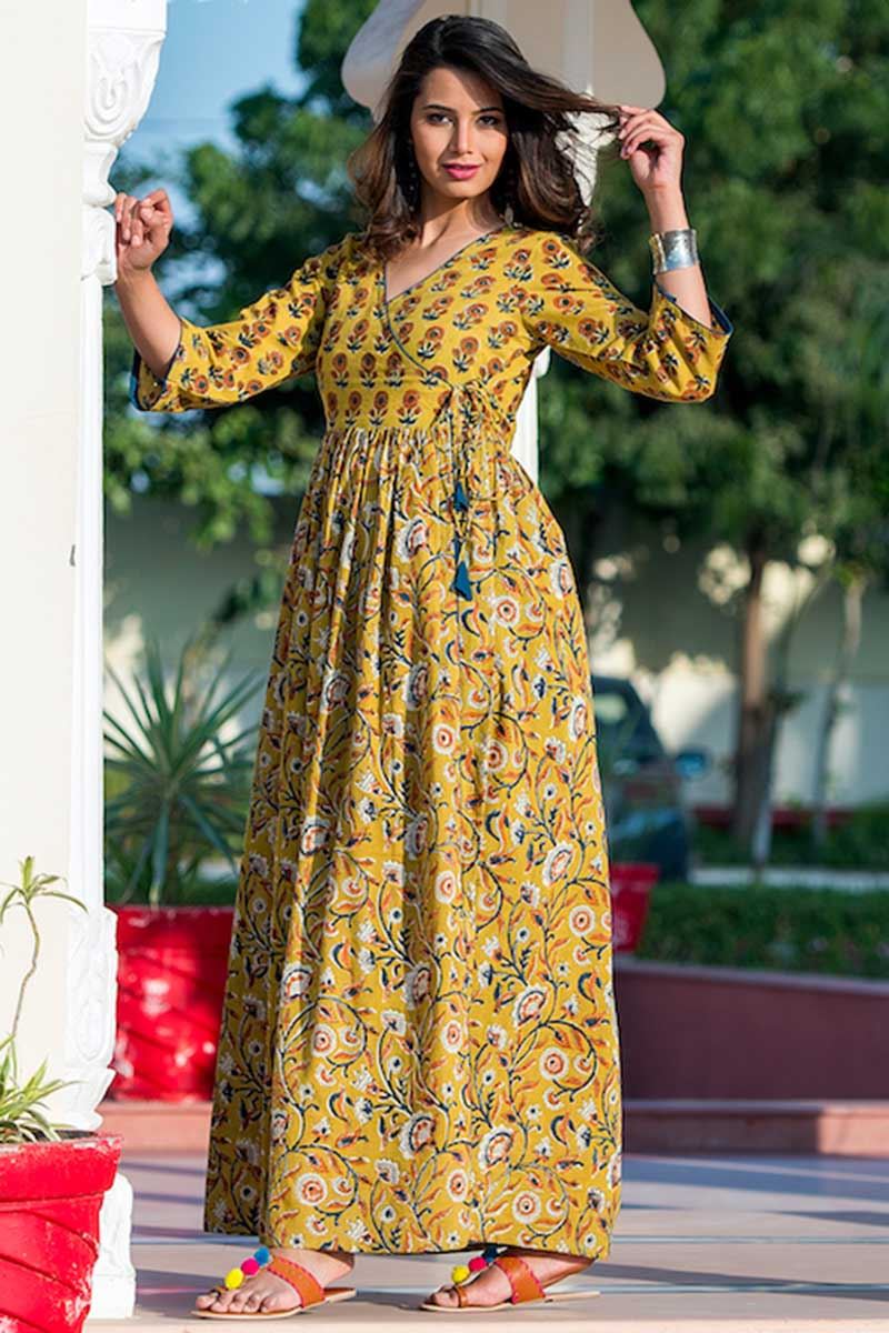 Yellow Colored Partywear Printed Muslin Kurti