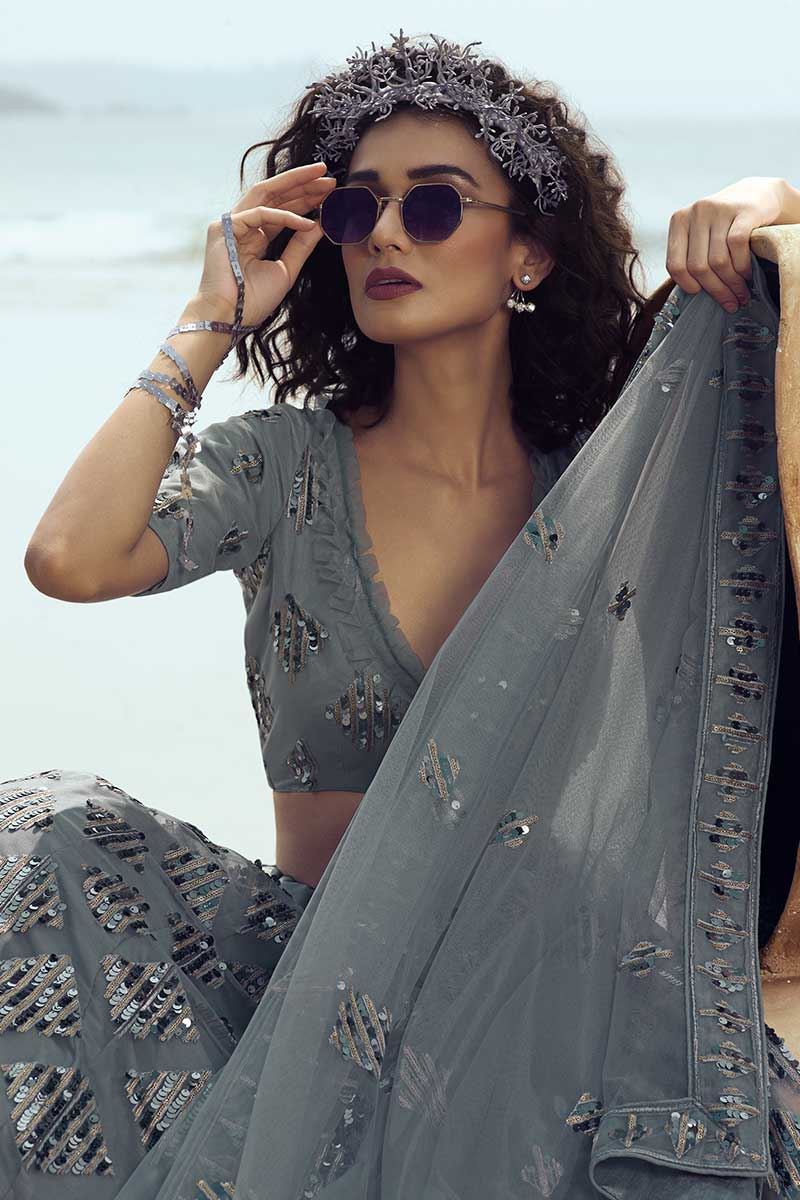 Stunning Grey Colored Partywear Embroidered Net Lehenga Choli