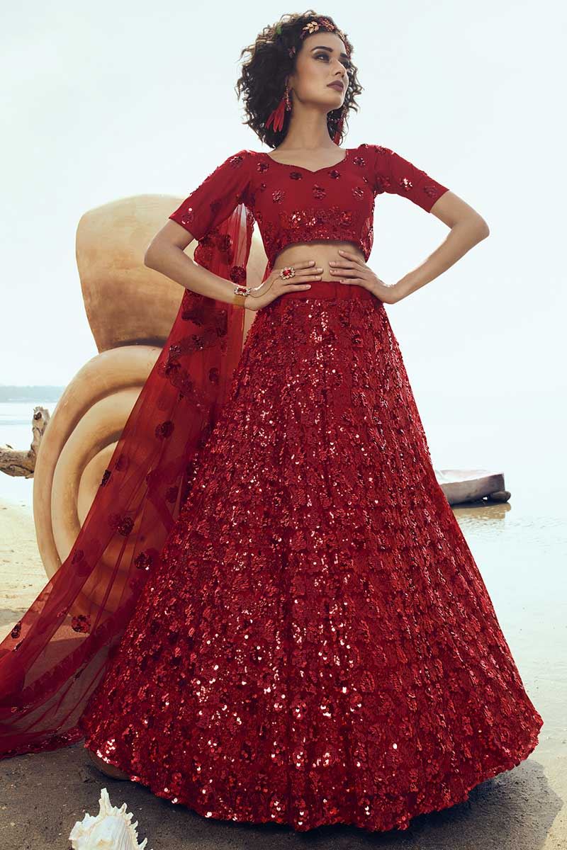 Demanding Red Colored Partywear Embroidered Net Lehenga Choli