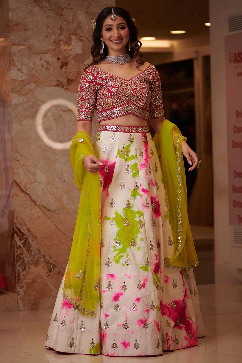 Graceful Off-white& Pink Colored Wedding Wear Silk Lehenga Choli