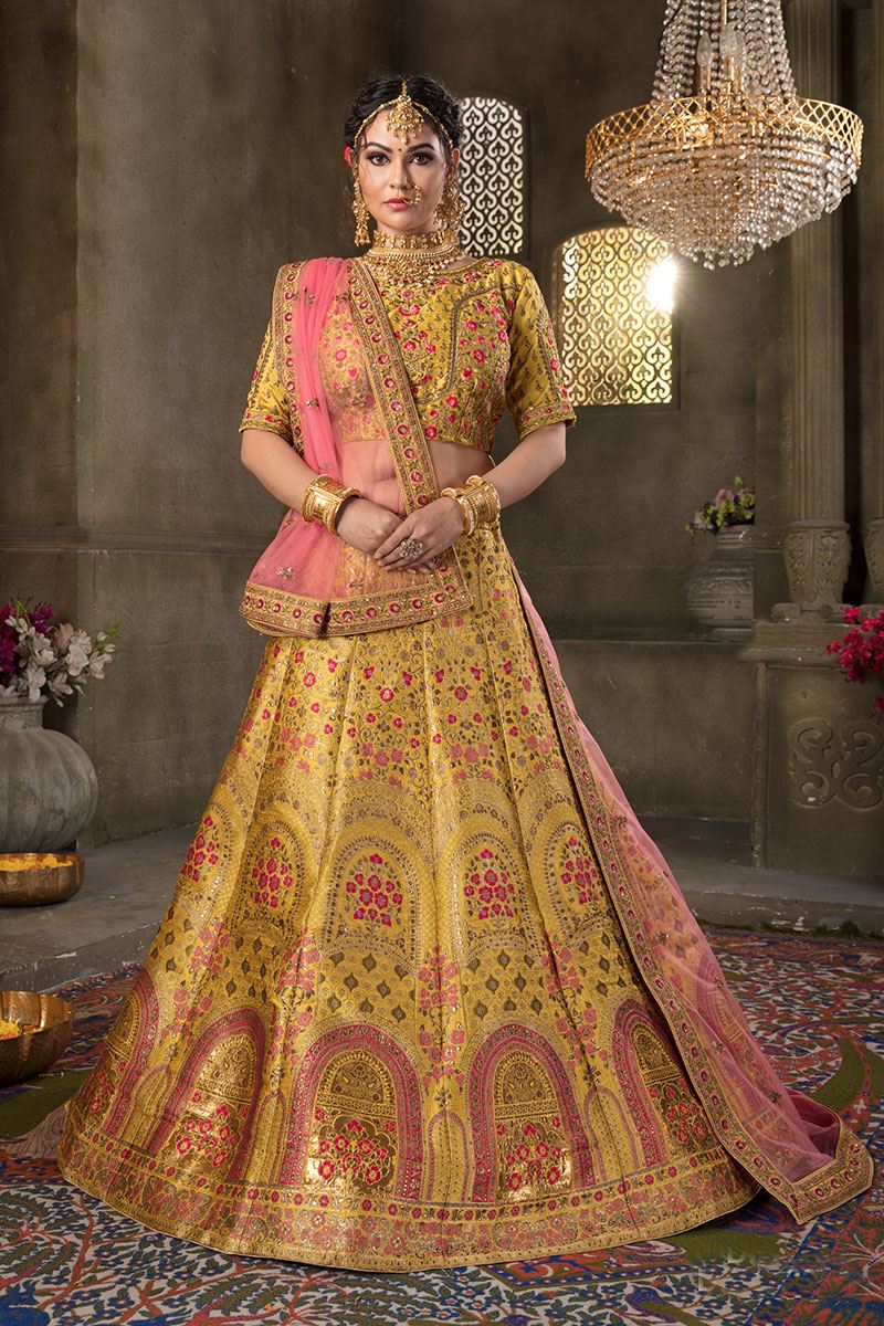 Mustard Yellow Colored Embroidered Silk Lehenga Choli With Net Dupatta