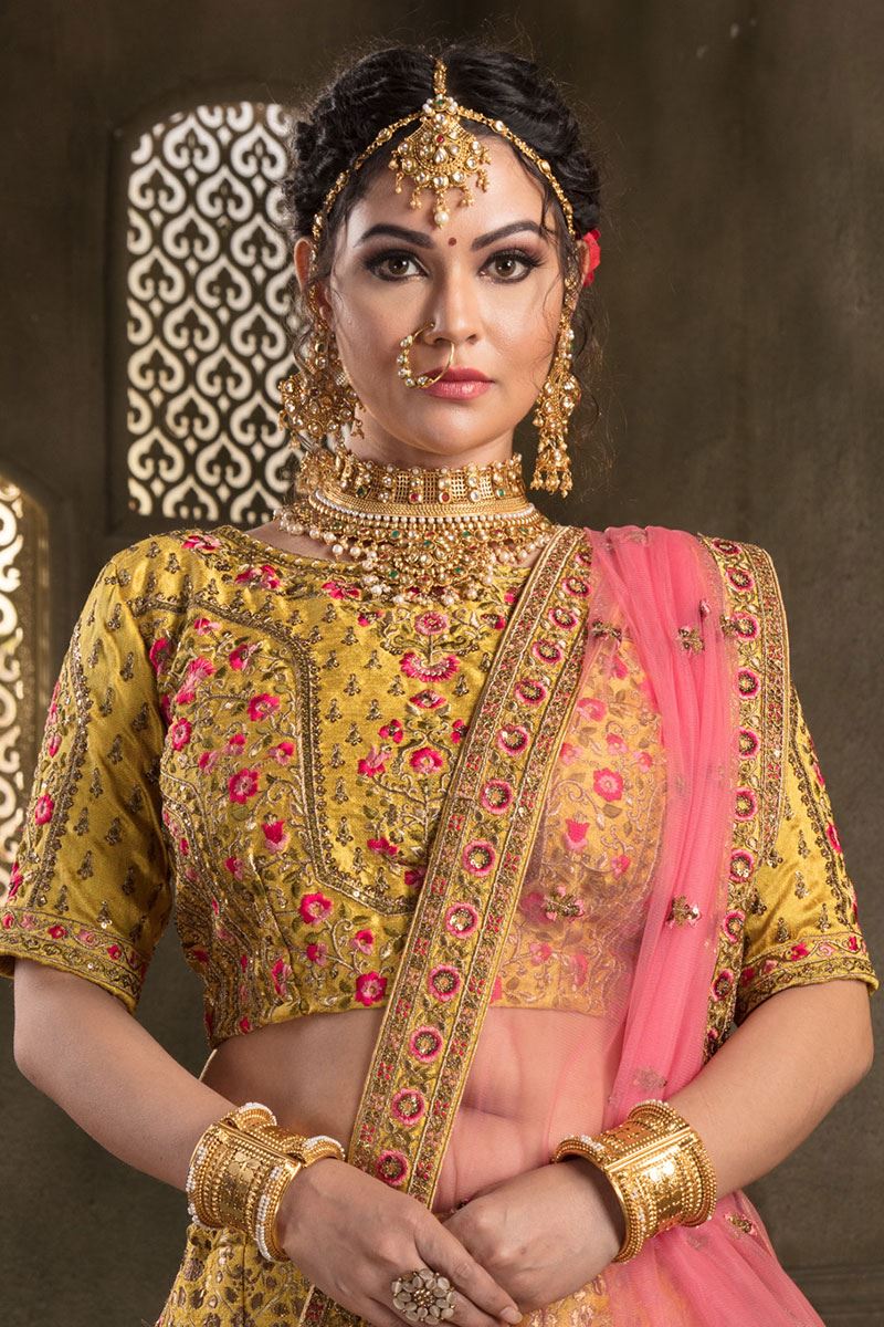 Mustard Yellow Colored Embroidered Silk Lehenga Choli With Net Dupatta