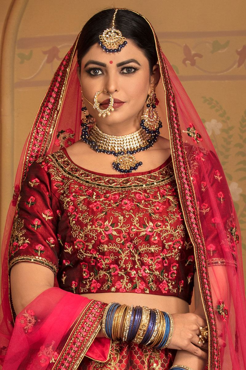 Marron Colored Embroidered Silk Lehenga Choli With Net Dupatta