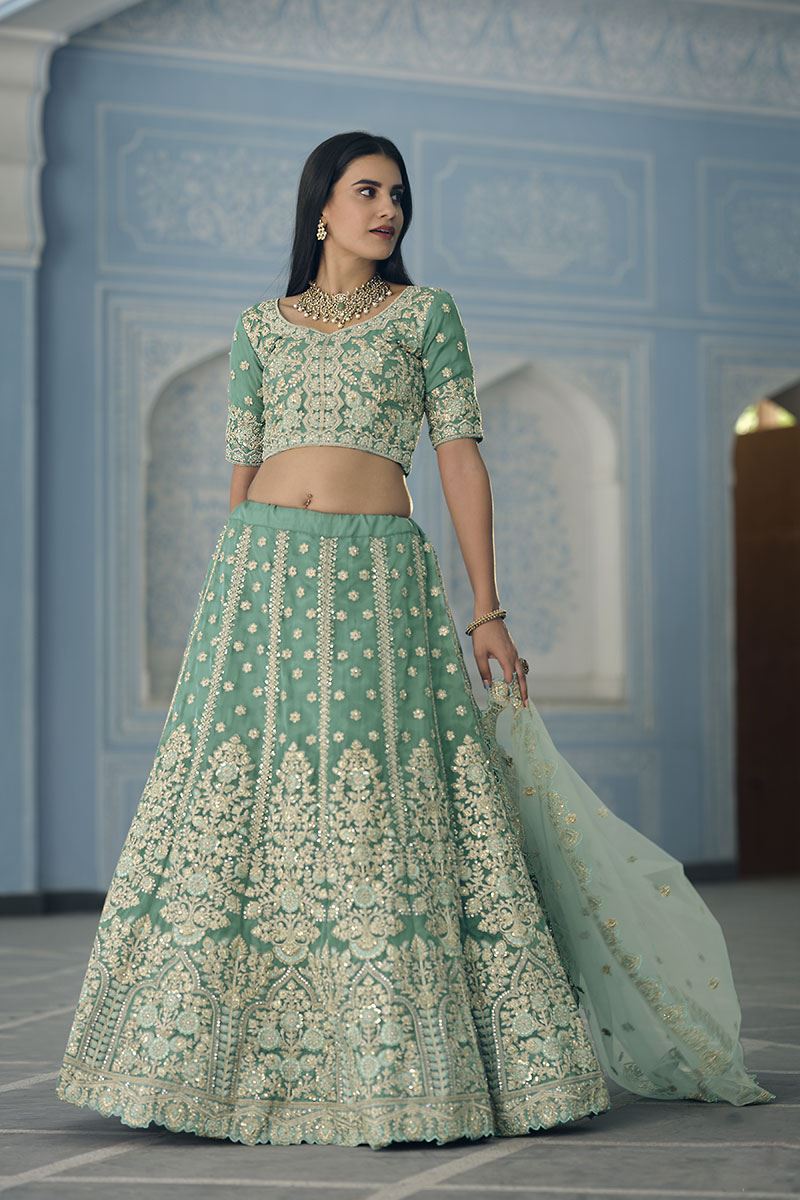 Charming Turquoise Colored Designer Lehenga Choli
