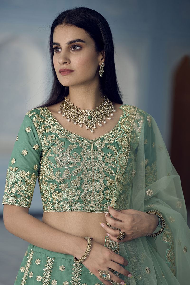 Charming Turquoise Colored Designer Lehenga Choli