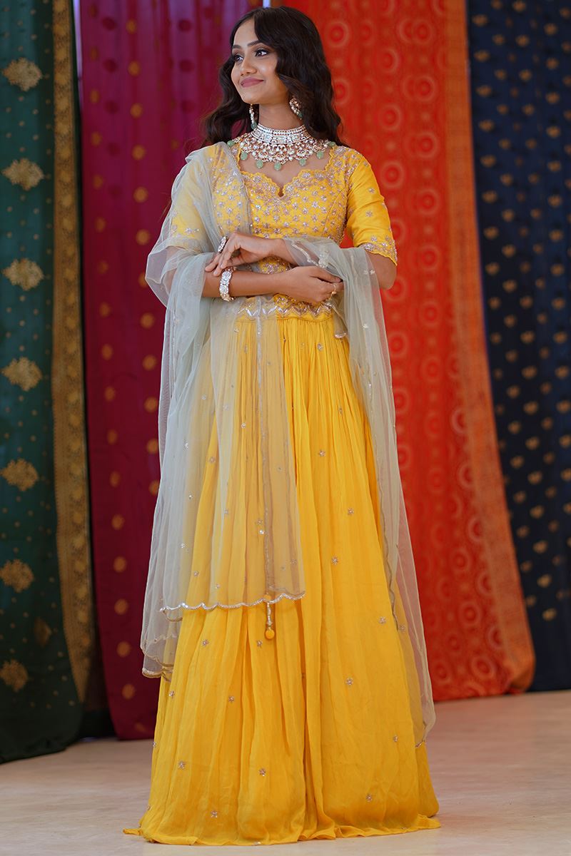 Exuberant Yellow Colored Designer Lehenga Choli