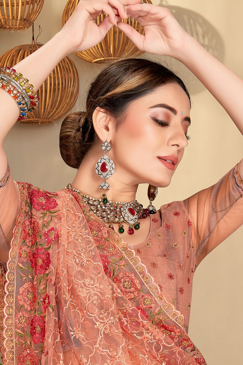 Exquisite Dusty Peach Colored Designer Saree