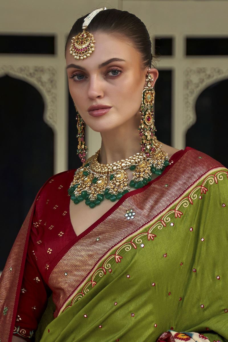 Delightful Parrot Green and Maroon Colored Designer Saree