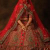 Exuberant Red Colored Bridal Lehenga Choli