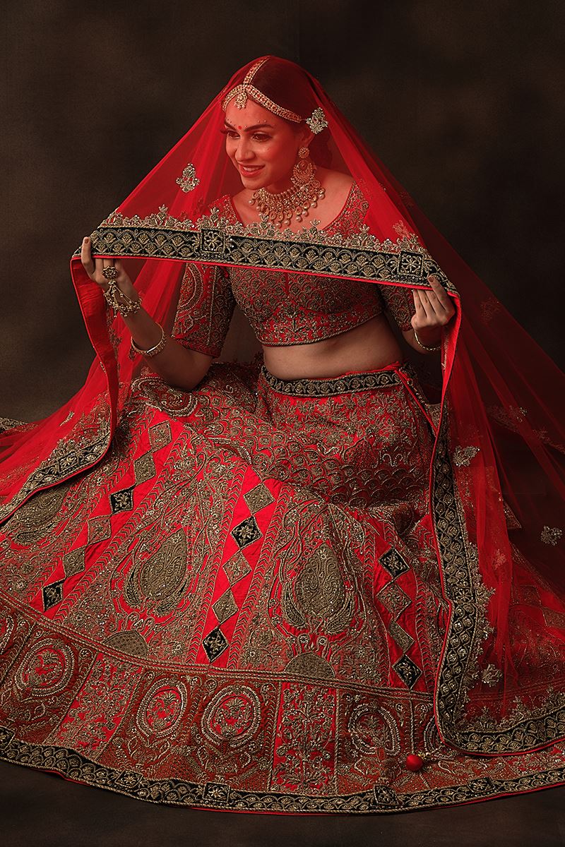 Exuberant Red Colored Bridal Lehenga Choli