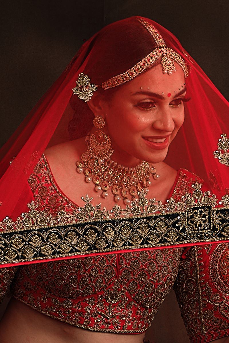 Exuberant Red Colored Bridal Lehenga Choli