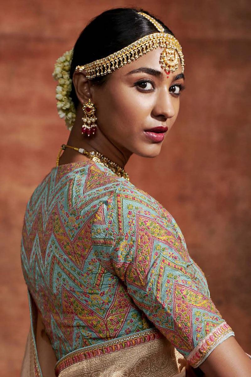 Charming Peach and Sky Blue Colored Designer Saree