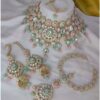 Fascinating Mint Green and Baby Pink Bridal Designer Necklace Set for an Engagement and Reception