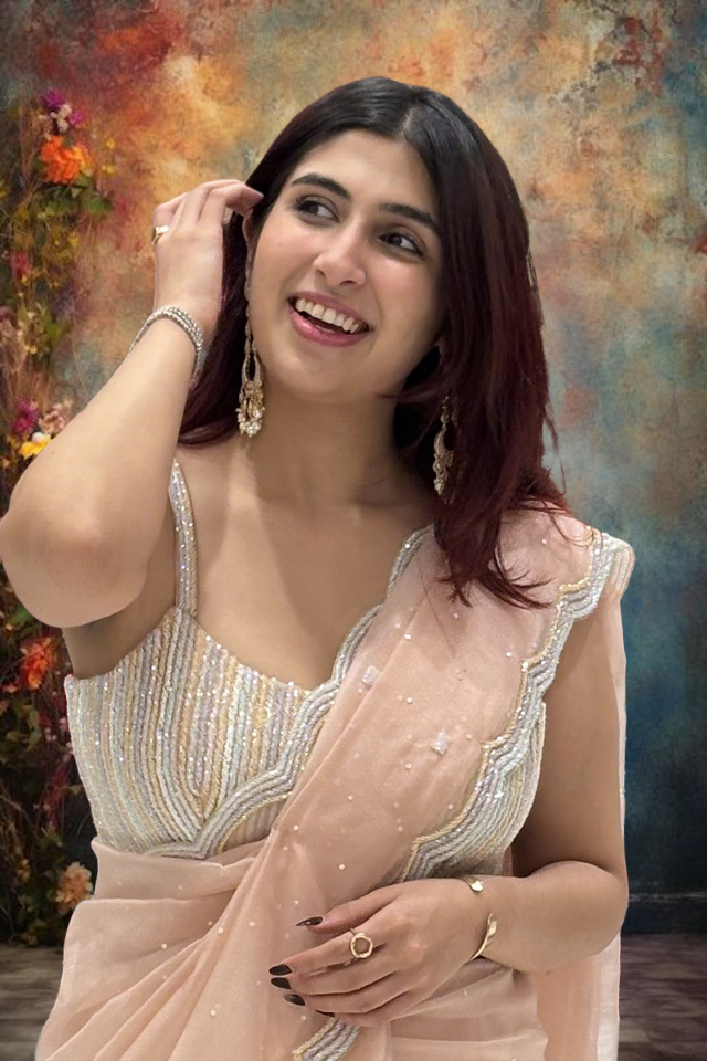 Flamboyant Peach Organza Designer Saree for Engagement, Reception, Sangeet, and Parties