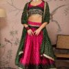 Mesmerizing Pink and Dark Green Designer Lehenga Choli for Navratri Festival, Sangeet, and Parties