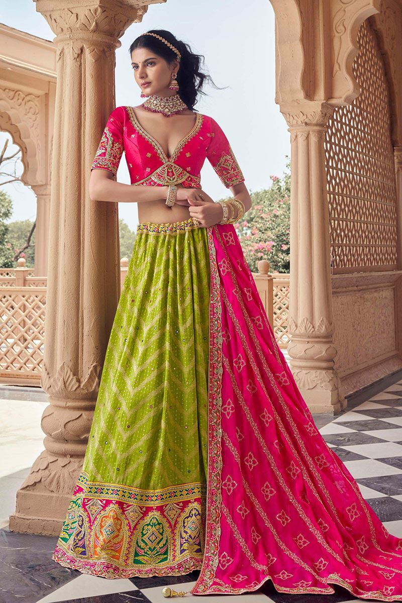 Exuberant Parrot Green and Pink Designer Wedding Lehenga Choli for Wedding and Reception